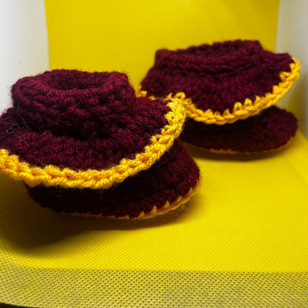 Burgundy and varsity yellow baby booties